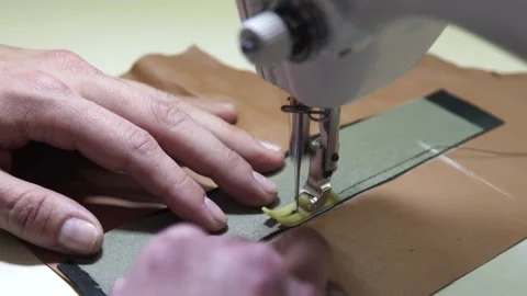 Close up shot. Professional sewing machine in action, leather sewing needle Slow Stock Footage 152780834