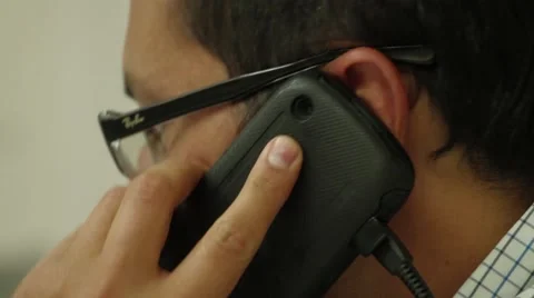 Close Up Shot of an professional worker talking on cellphone Stock Footage 45236302