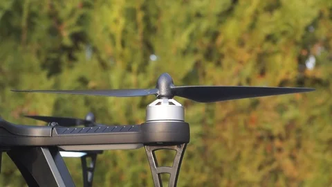 Close up shot of propeller spin up and the drone take off Stock Footage 99517293