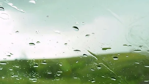 Close up shot of rain drops falling down. Stock Footage 112568797