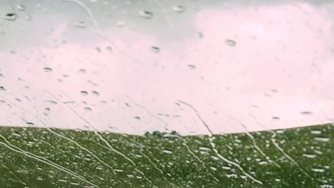 Close up shot of rain drops falling down Stock Footage 114231611