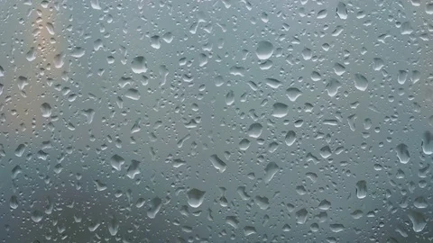 Close up shot of raindrop. Drops of rain on window glass. 4K Vidéo 126026661