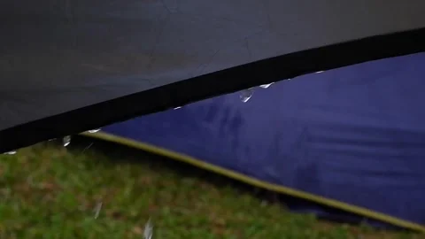 Close-up shot of raindrops on the tent Video stock 308727125