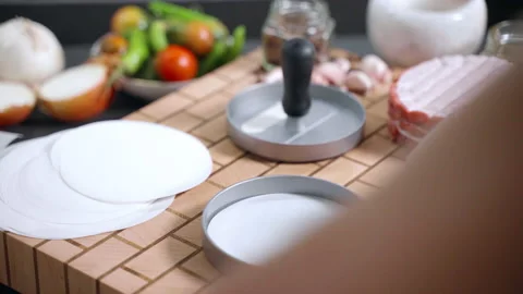 Close up shot of raw burgers preparation on professional wooden board Stock Footage 211408053