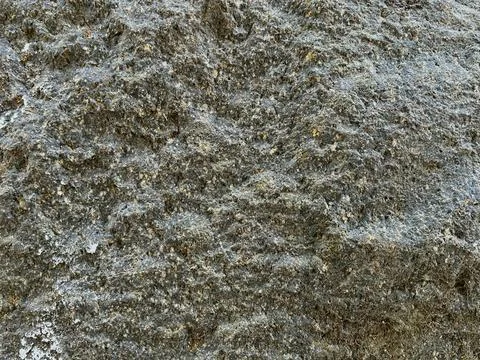 Close-up shot of raw rough stone surface Stock Photos