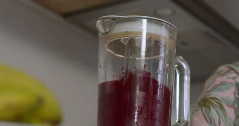 Close-up shot of a ready-made smoothie in a blender for breakfast 스톡 동영상 147853573