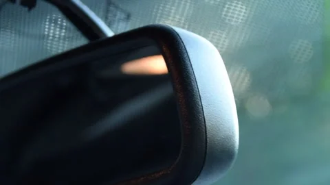Close Up shot of rear view mirror with sunflair in Ford Mustang Muscle Car Stock Footage 141643752