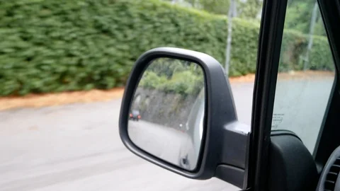 Close up shot of rearview mirror or sideview of a car, Concept summer vacation h Stock Footage 95246840