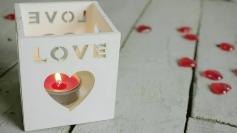 Close shot of red candle in lantern with love text on it. Valentines day. Stock-Footage 85274401