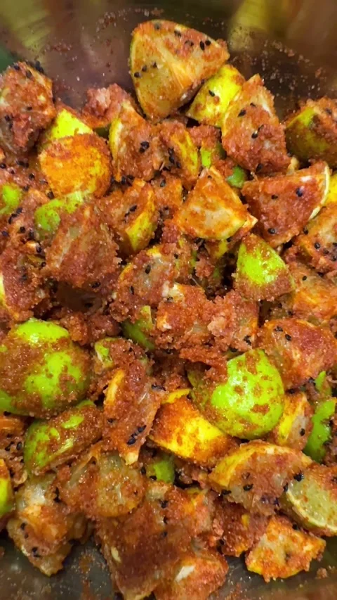 Close of shot of red chilli powder lemon pickle Stock Footage 326476253