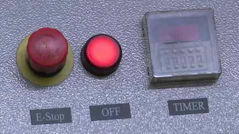 Close up shot of red panic emergency stop button. Stock Footage 218609911