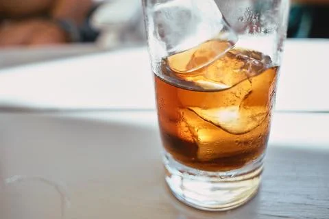 Close-up shot of a refreshing cold carbonated soft drink served with ice cube Stock Photos