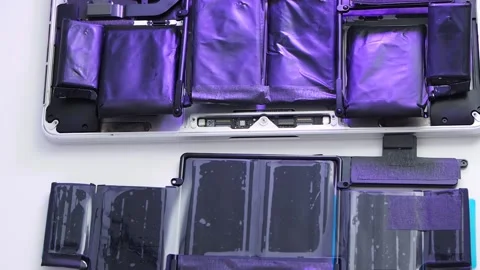 Close-up shot. Replacing the battery on your laptop Stock Footage 131846857