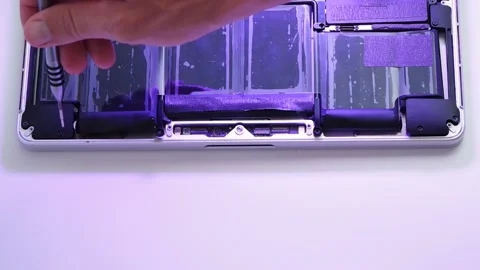 Close-up shot. Replacing the battery on your laptop Stock Footage 131847040