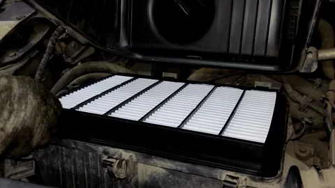 A close-up shot of replacing an engine air filter tvai Stock Footage 336273152