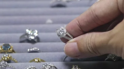 Close-Up Shot Of A Ring With A Diamond In Jewelry Shop Display. Stock Footage 139851396