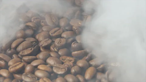 Close-Up Shot of Roasted Coffee Beans. Close-up view of coffee roasting, the Stock Footage 195991655