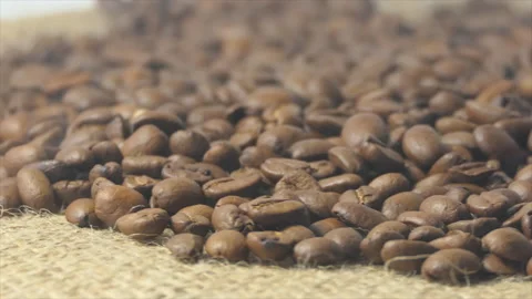 Close-Up Shot of Roasted Coffee Beans. Close-up view of coffee roasting, the Stock Footage 196929819