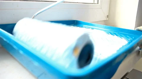Close up shot of roller and paint bucket Stock Footage 65287867