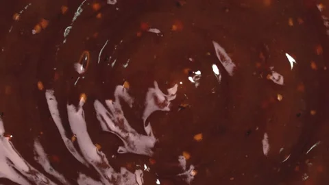 Close up shot of rotating blackpepper sauce. Top view. Stock Footage 218643438