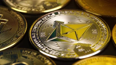 Close up shot of rotating shining Ethereum token. Stock Footage 172119384