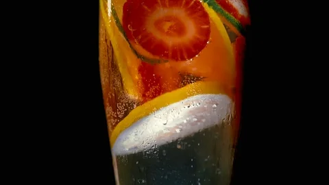 CLOSE UP SHOT ROTATING STRAWBERRY LEMON LIME SODAWATER 動画素材 93971791