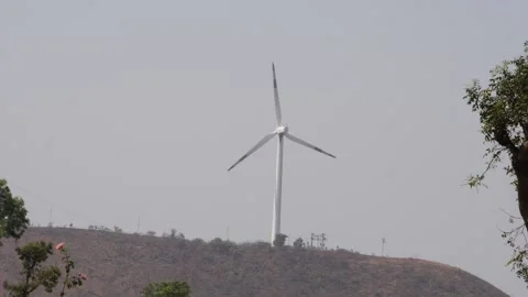 Close shot of rotating wind mill fan on hill Video stock 151907627
