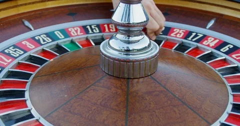 Close up shot of a roulette wheel, as the ball is slowly spinning down the Stock Footage 121742580