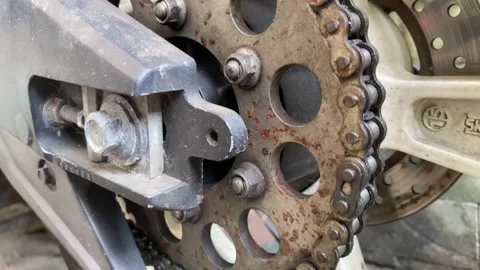 Close-Up Shot Of Rusty Chain And Metal Gears on motorcyle. motorbike gear and ch Stock Footage 214141625