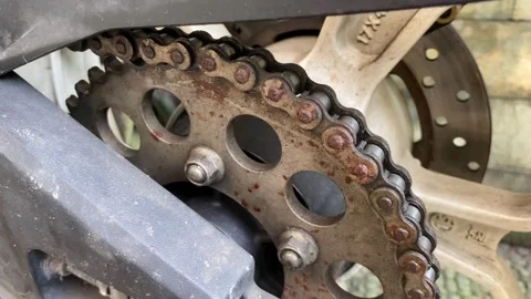 Close-Up Shot Of Rusty Chain And Metal Gears on motorcyle. motorbike gear and ch Stock Footage 214141951