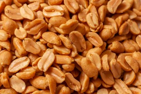 Close up shot of salted peanuts Stock Photos