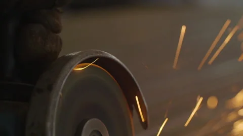 Close-Up Shot of the Sawing Disc Grinder Sparks Fly Man is Not Seen in the Stock Footage 68508010