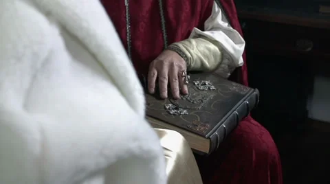 Close shot of scholar opening an old book Stock Footage 33735259
