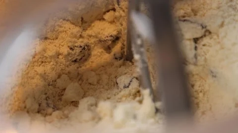 Close-up shot of scones mixture mixed in... | Stock Video | Pond5