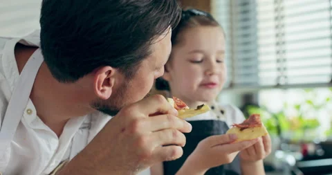 Close up shot selective focus on bearded father and preschooler curious daughter 스톡 동영상 218640961