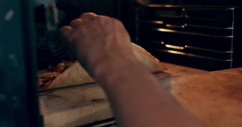 Close up shot selective focus on industrial new oven and freshly baked inside Stock Footage 218639045