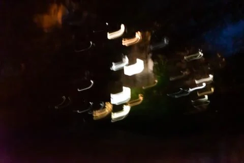 Close up shot of Several different colored lines moving in the dark. Camera m Stock Photos