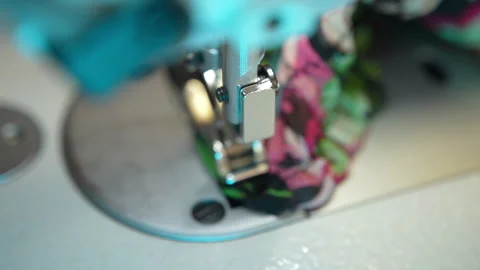 Close up shot of sewing needle and thread in working process, seamstress working Video stock 252428015