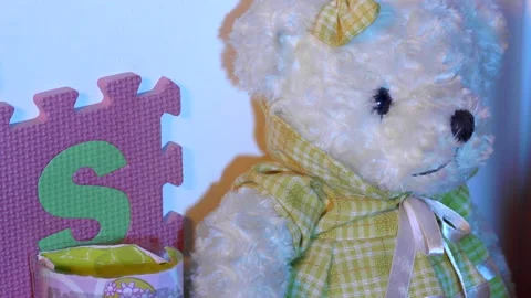 Close-up shot of shadows playing on the face of a very creepy doll Stock Footage 234326366