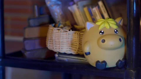 Close-up shot of shadows playing on the face of a very creepy doll Stock Footage 234326881