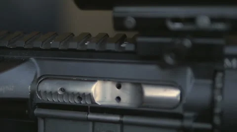 Close Shot of Shell Falling Out of Gun Stock Footage 60711866