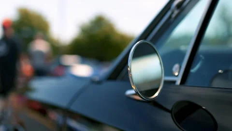 Close up shot of shiny side view mirror on a classic car Stock Footage 277615017
