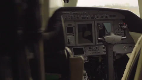 Close up shot showing empty cockpit of Cessna Citation Jet with digital Video stock 152979163