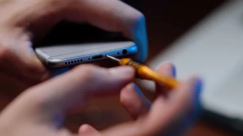 Close-up shot showing the process of cell phone repairing. Stock Footage 229971979
