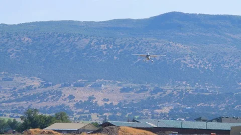 Close up shot showing white plane as it lands Video stock 116736111