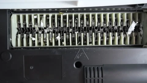 Close up shot of Shredder Cutting Paper. View From Below, Stock Footage 294153682