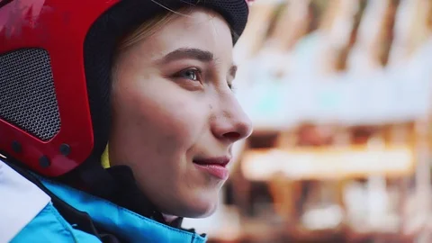 Close up shot of side attractive young the woman enjoys nature feel happy skier Stock Footage 121066456