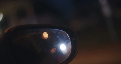 Close up shot of a sidemirror at night Video stock 135595640
