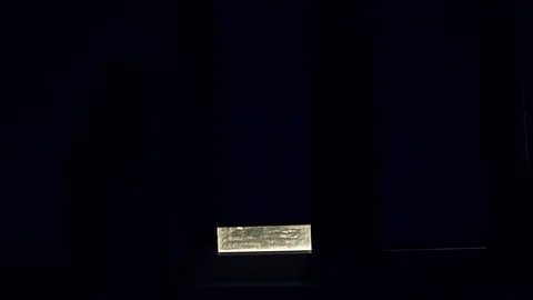 Close up shot of silhouette man open striped blinds on a window in dark dirty Stock Footage 105203260