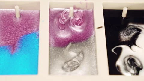 Close-up shot of silicone mold filled with epoxy resin colours mix, craftsman in Video stock 263194201